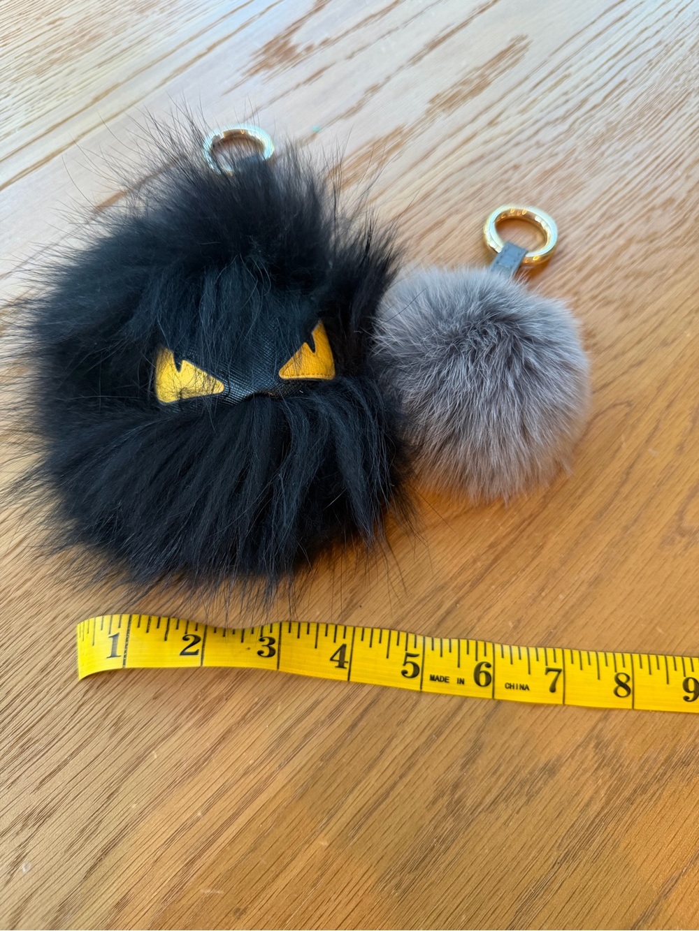 Black Faux Fur Monster Pom Keychain with Yellow Eye Accents - Picture 3 of 4
